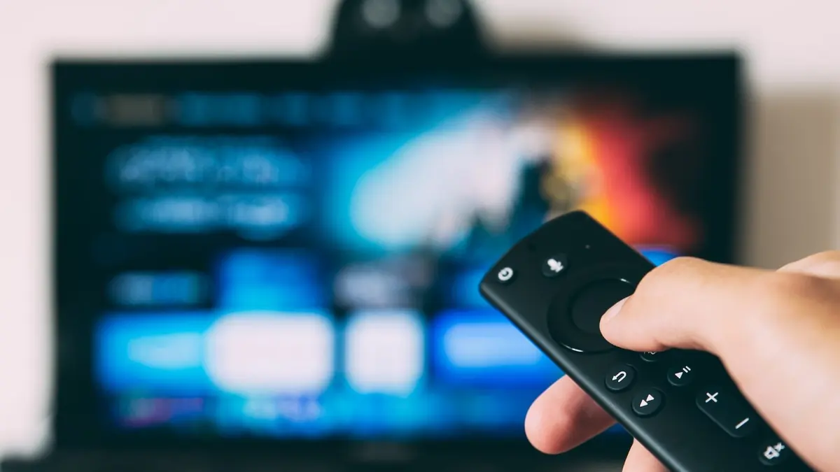 turned-on flat screen television