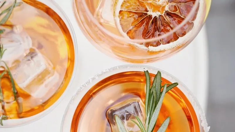 four glass cups on white surface