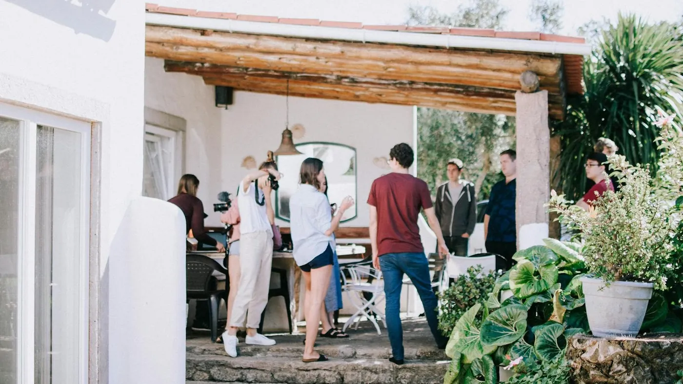 People Standing Under the Awning