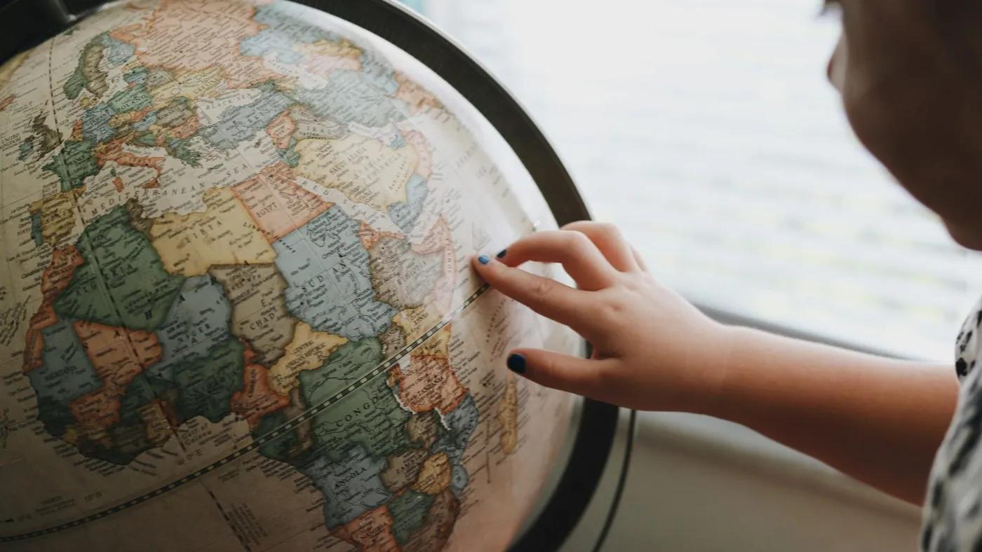 beige and blue desk globe