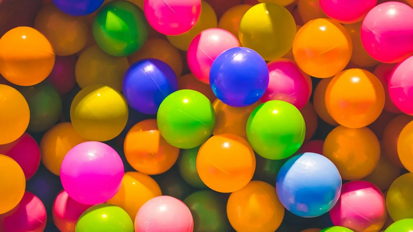 high angle photo of assorted-color plastic balls