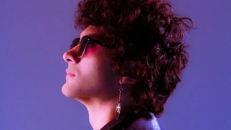 woman in black shirt wearing sunglasses