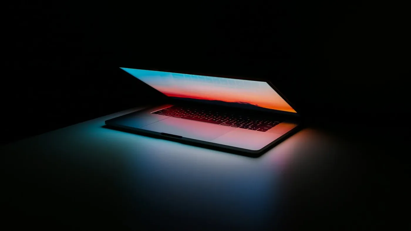 gray and black laptop computer on surface