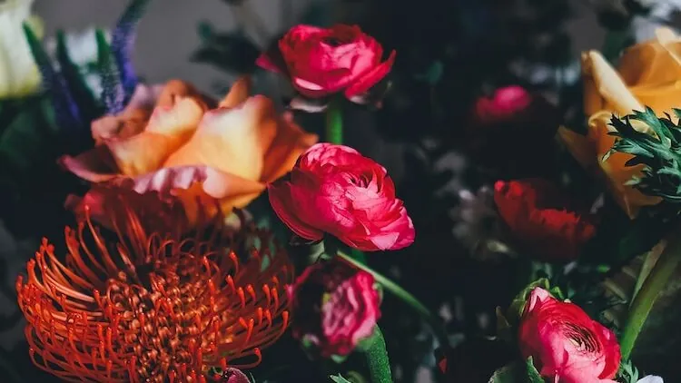 assorted petaled flowers centerpiece inside room